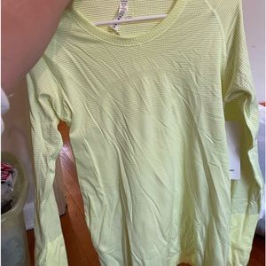 Bright yellow Lululemon long sleeve swiftly